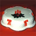 A Christmas cake with quilted icing decoration.